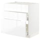White METOD kitchen cabinet with glossy finish and pull-out shelves.
