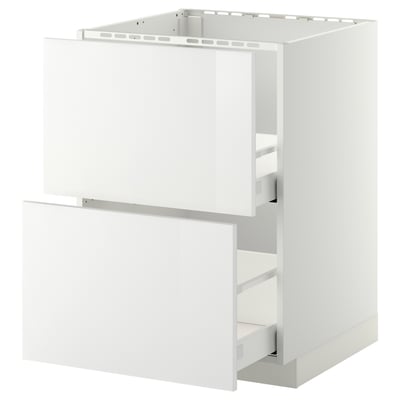 A white METOD kitchen base cabinet with a partially open drawer, designed for a built-in oven or sink. It a modern, high-gloss finish.