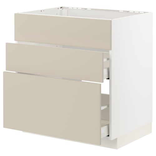 White METOD kitchen unit with beige drawers and smooth design.