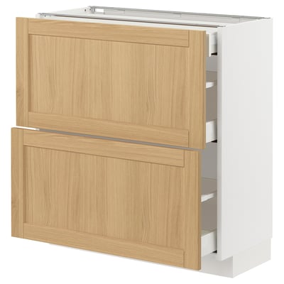 Modern kitchen unit, METOD. White and light wood. Three drawers, sleek design. Self-closing drawers.