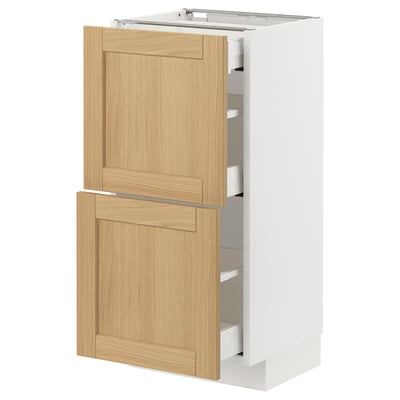 METOD kitchen cabinet with wooden look drawers, featuring two pull-out shelves on left, white right side.