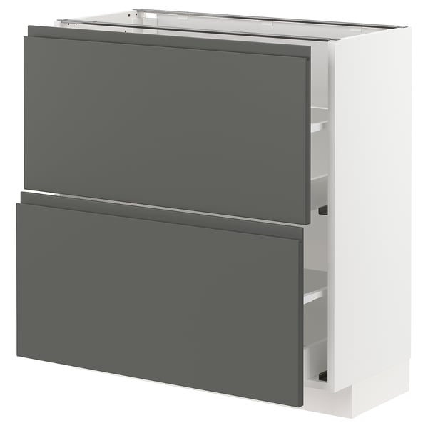 A modern kitchen cabinet unit in white and dark grey with integrated handles. It two drawers and a cabinet with soft-close drawers.