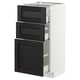 Modern kitchen unit with black stained drawers, white cabinet, three drawers, and one door.