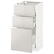 METOD white kitchen cabinet with 3 drawers, high-gloss finish.