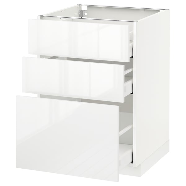 A white, sleek cabinet with three drawers from ikeas METOD kitchen system, featuring high gloss fronts and smooth-running drawers.