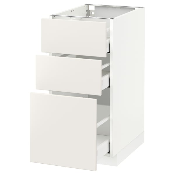 White METOD kitchen drawer unit with three pull-out drawers.