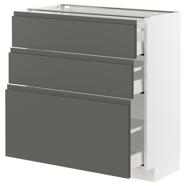 Modern dark grey METOD kitchen unit with three drawers and white frame.