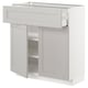 White METOD kitchen cabinet with drawer and shelves.