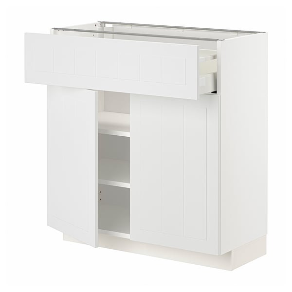 White METOD kitchen cabinet with drawer and shelves, classic design.