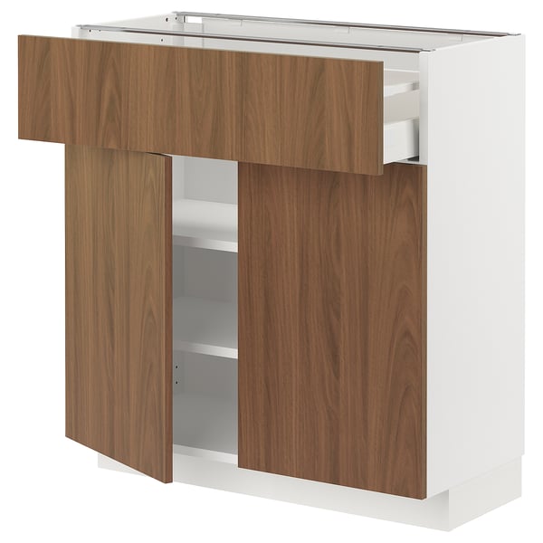 Modern kitchen unit with wood grain effect doors and white frame, featuring three shelves and one drawer.