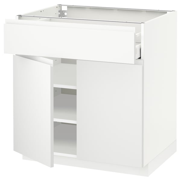 White modern kitchen cabinet with drawer and glass top.