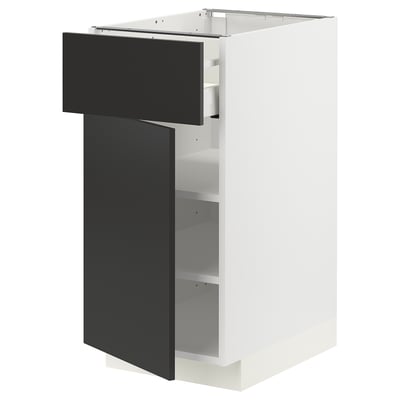 Modern white and black kitchen cabinet with adjustable shelves and soft-closing drawers.