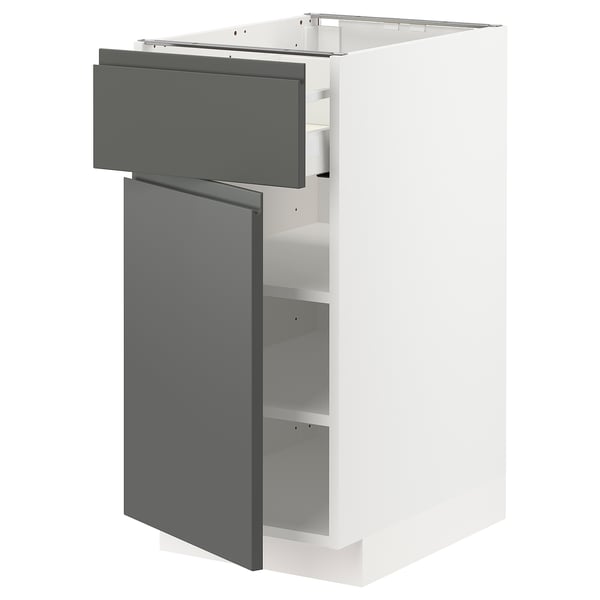 Modern kitchen cabinet, white & grey, square, sleek design with integrated handles & adjustable shelves.