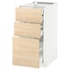Light wood drawers in white cabinet, modern kitchen furniture.