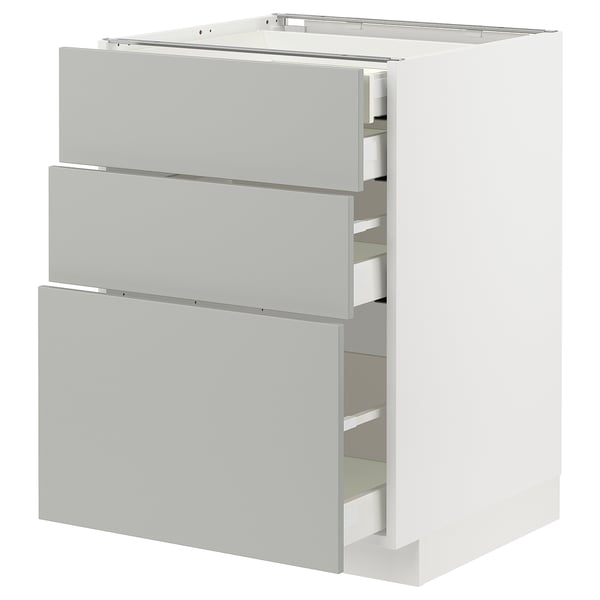 A white METOD cabinet with light grey drawers in a modern design. It has three drawers with sleek, low-profile handles.