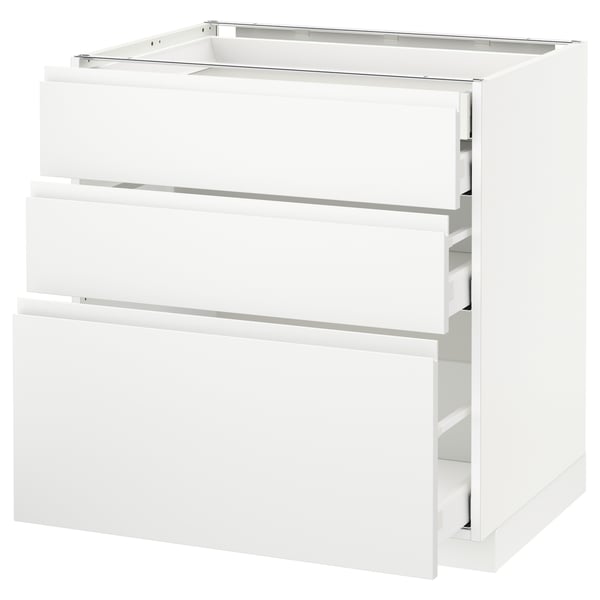 An all-white METOD kitchen cabinet with sleek, minimalist handles and drawers.