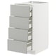 White METOD kitchen unit with four light grey drawers, sleek modern design.
