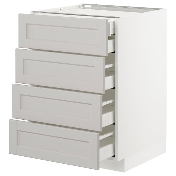 White METOD kitchen unit with four grey drawers, bevelled edges, and built-in dampers.