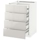 A white, modern kitchen cabinet unit with four open drawers, featuring a contemporary design.