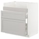 An ikea METOD light grey kitchen cabinet with beveled edges and drawers.