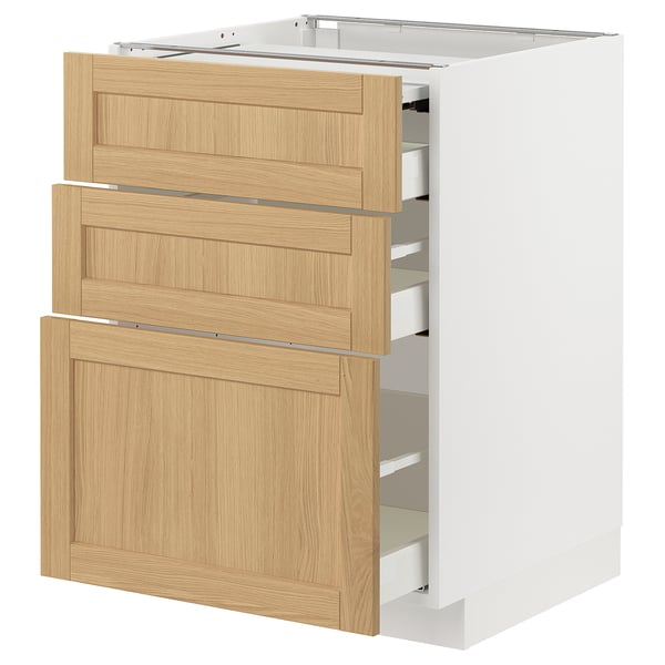 Modern kitchen cabinet, light wood drawers, white frame, sleek design.