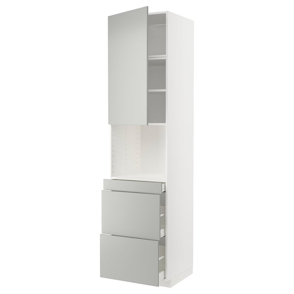 White METOD kitchen cabinet with grey drawers and shelves.