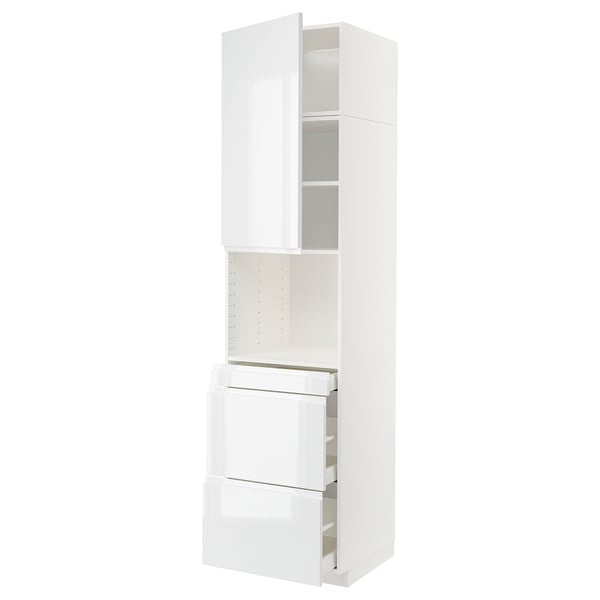Modern white METOD kitchen cabinet, glossy finish, has two open doors, three drawers, and a single shelf.