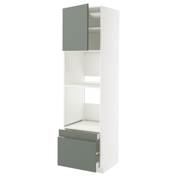 A white METOD kitchen unit with a greenish-gray drawer and cabinet door. It a pull-out drawer and adjustable shelves.