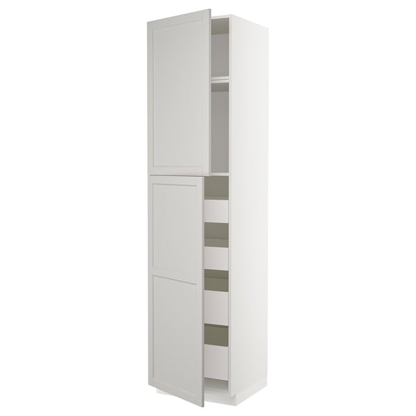 A white METOD kitchen cabinet with light grey trim and bevelled edges. Its tall and rectangular, featuring two doors and multiple shelves inside.