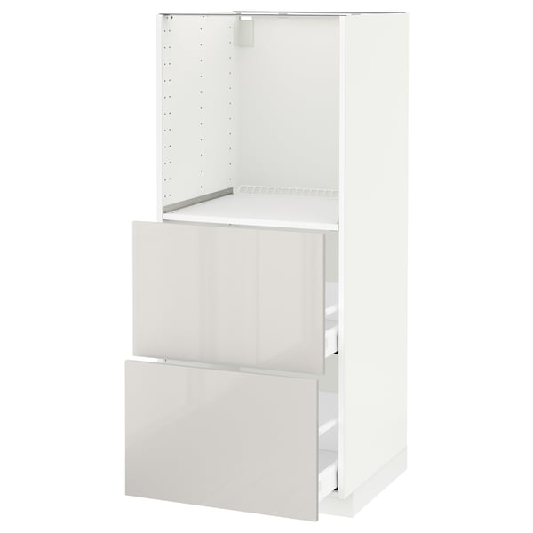 A white METOD kitchen cabinet with a high gloss finish and adjustable shelves.