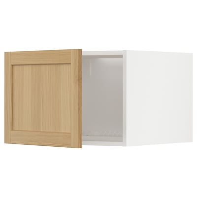 Wooden METOD cabinet with light oak door and adjustable shelves.