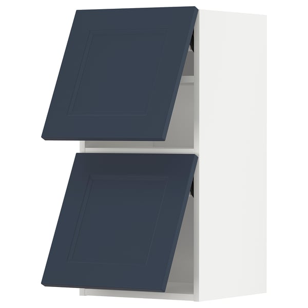 This image shows two dark blue kitchen cabinets with square doors. They are part of the METOD kitchen system & feature sleek, modern design.