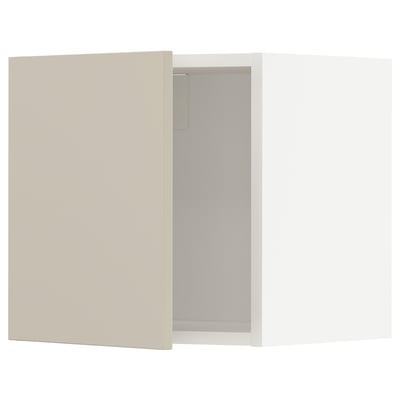 A beige METOD kitchen cabinet with a smooth finish and clean design, featuring a single door mounted on hinges.