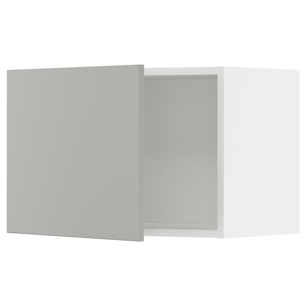 Light grey METOD kitchen cabinets door and frame on white.