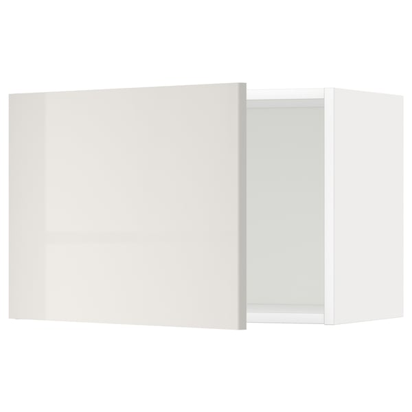 White METOD wall cabinet, sleek design, glossy finish.