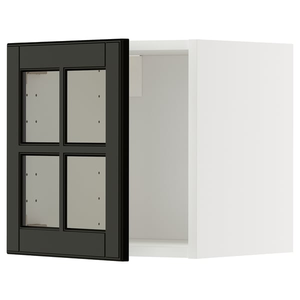 Black and white kitchen cabinet with glass doors, sleek modern design.