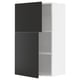 Modern kitchen cabinet, white with black doors, sleek design, adjustable shelves.
