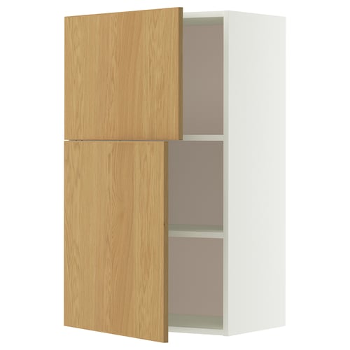 A white and light wood cabinet. It two adjustable shelves and a door with oak veneer.