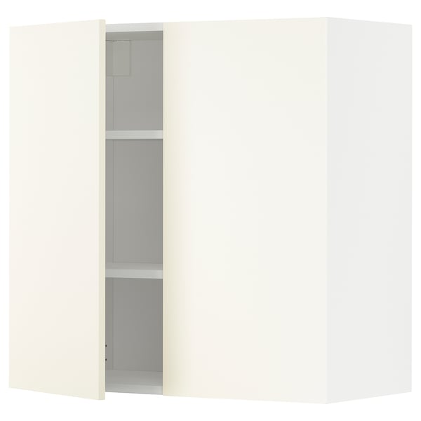 METOD white kitchen cabinet, rectangular, modern design with a door open showing shelves.
