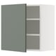 Modern kitchen cabinet with grey-green door and white shelves.