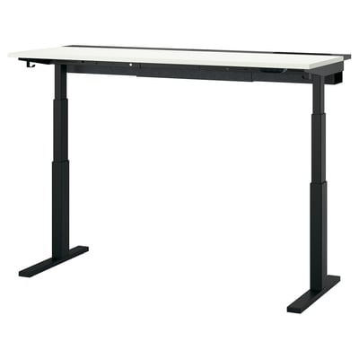 The MITTZON sit-stand desk is sleek, black, and height-adjustable. It a white top and sturdy legs, promoting ergonomic comfort.
