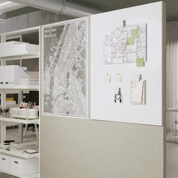 Office partition screen with whiteboard; map pinned, notes attached, sound-absorbing.