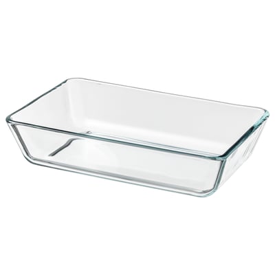 Clear glass oven dish, simple design, rectangular shape. Safe for microwave, oven, and dishwasher.
