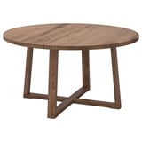 MÖRBYLÅNGA round oak table, natural colour, solid wood design, four legs.