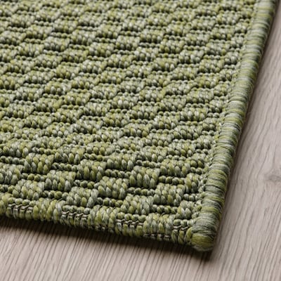 MORUM olive-green flat-woven outdoor rug. Rectangular, plain texture, durable polypropylene.