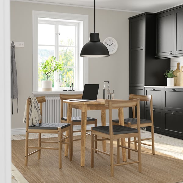 Cosy dining space with NACKANÄS acacia wood table & chairs. Round design, small size fits well in kitchen.