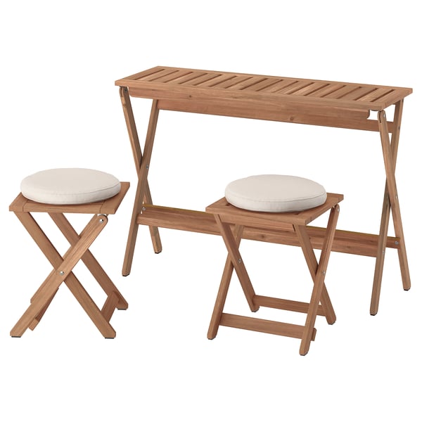 NÄMMARÖ: brown wooden outdoor table, two stools with beige cushions.