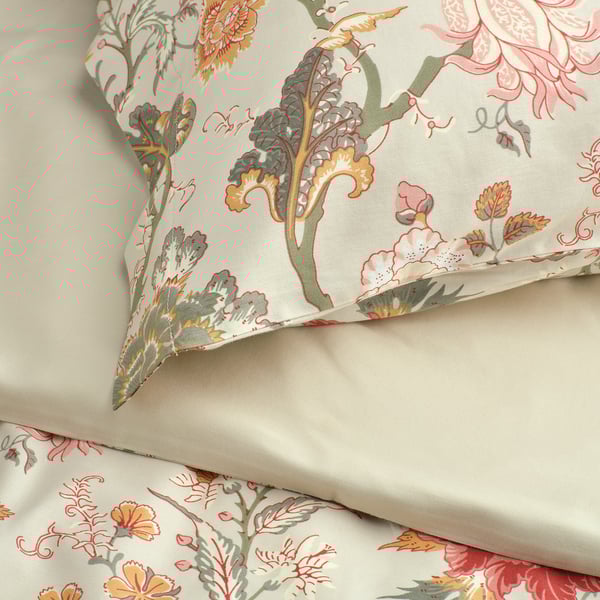 Floral pillowcase, sateen-woven, soft cotton/viscose blend; cream & multicolor flowers, elegant design.