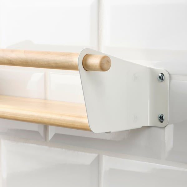 Modern wall shelf with wooden rail, securely attached to clean white wall. High-quality materials and sleek design ensure durability and organisation.