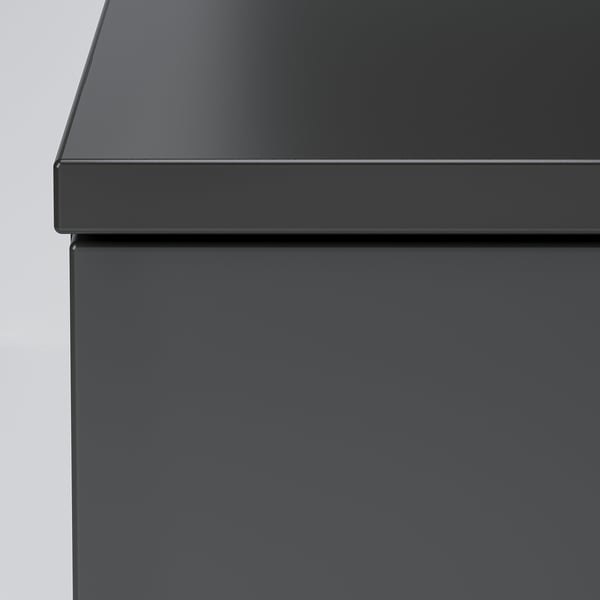 Modern black NORDLI furniture, smooth edges, sleek design.